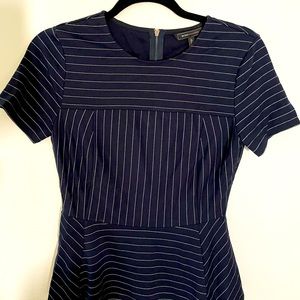 Navy striped peplum top